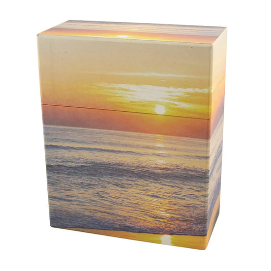 Rectangular box with a sunset over water design on a white background
